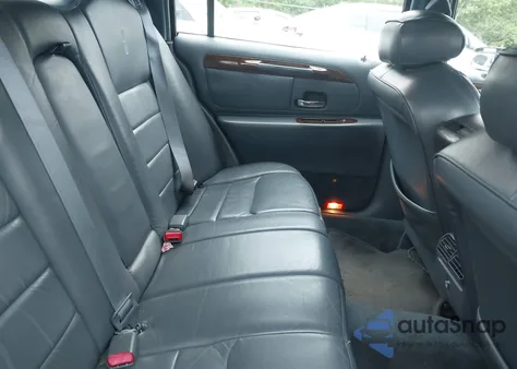 1999 Lincoln Town Car Executive из США, поврежденный, VIN 1LNHM81W0XY718096